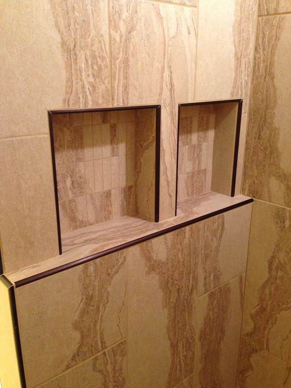 Cutouts in Shower Tiled